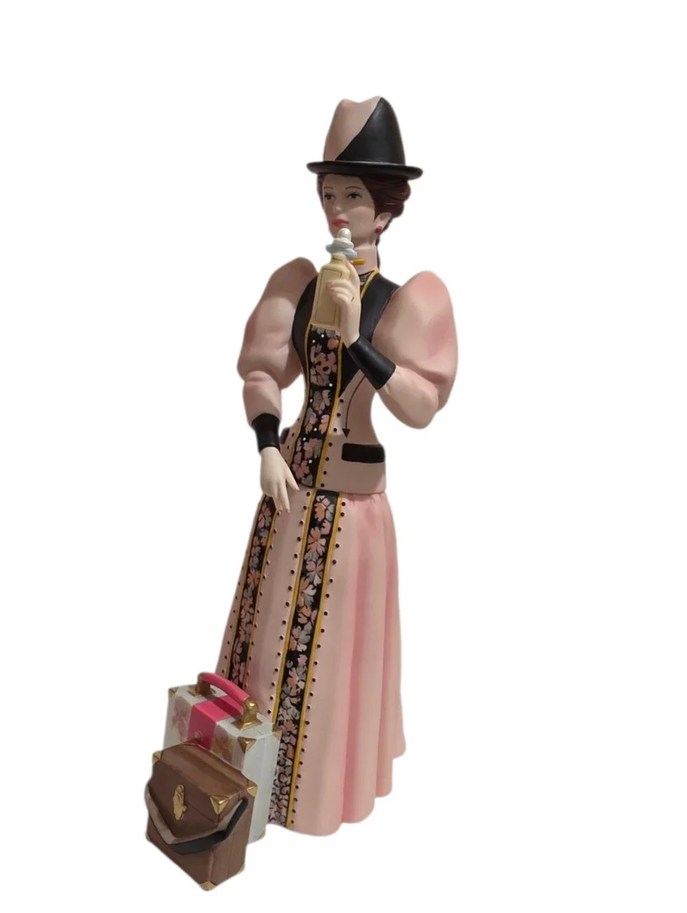2004 Avon Mrs. PFE Albee President's Club Award porcelain figurine.